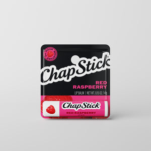 Red raspberry lip balm stick in black ChapStick wrapper